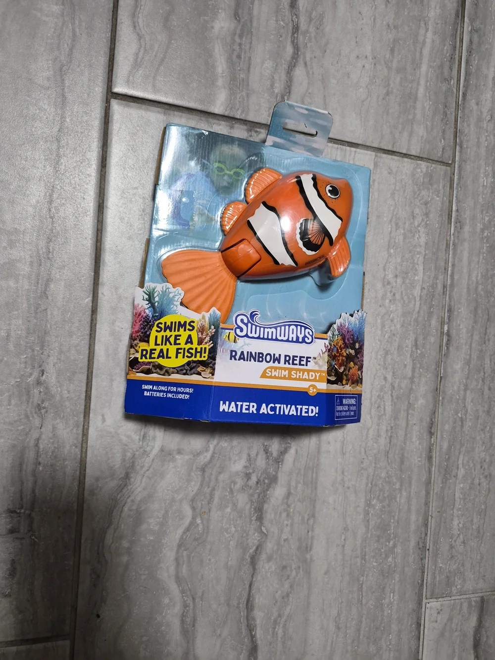 Swimways Rainbow Reef Swim Shady Water-Activated Orange Clownfish Toy 5+